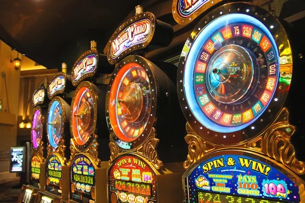Hacksaw Gaming slot interface with reel grid and paylines displayed